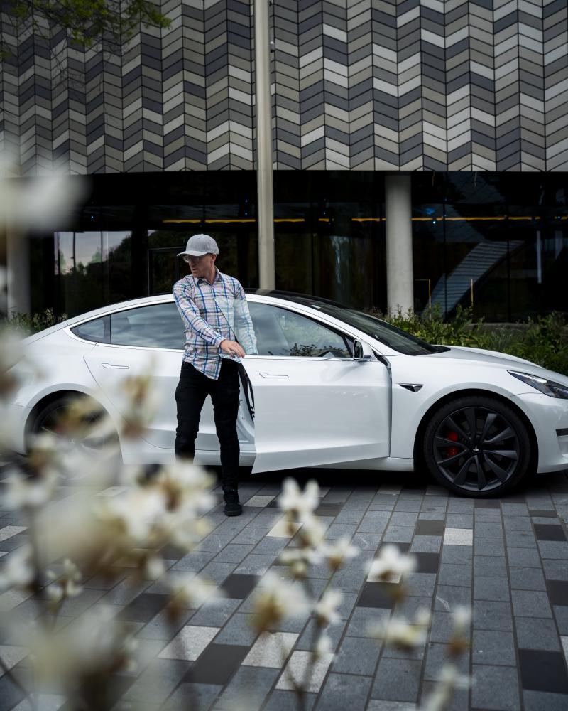 Tesla Model 3 Performance — South Island backdrop.